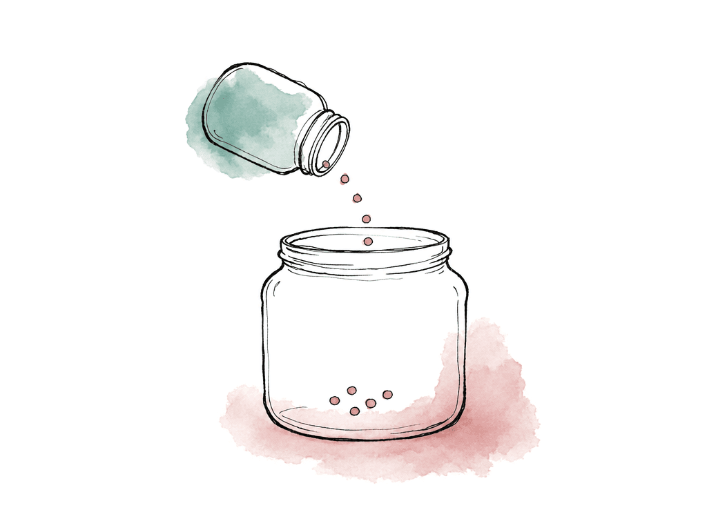 A small container of colored dots is poured into a larger empty container without adding more dots.
